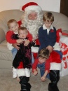 2002-12-24 four Grandkids with Santa.jpg